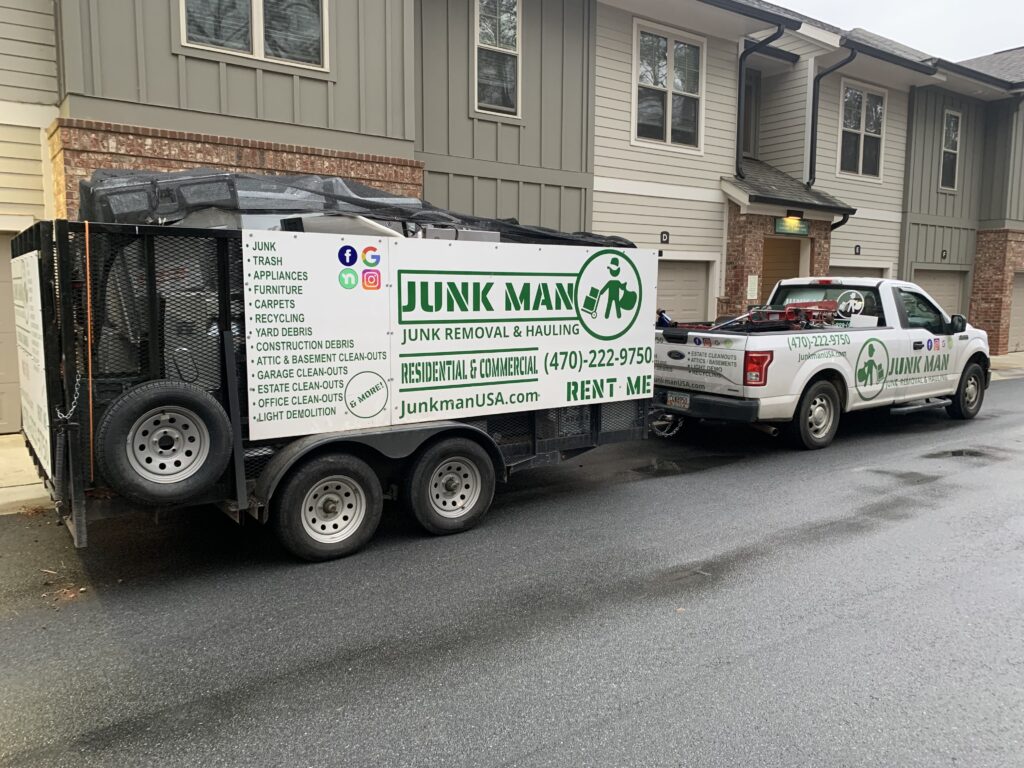 Junk Man Junk removal and Hauling doing an property clean. The best junk removal services in the Metro Atlanta area