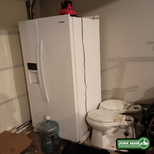 Refrigerator removal service in Kennesaw GA with large side by side fridge ready for professional appliance hauling and disposal.
