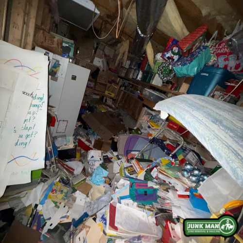 hoarder junk removal in Kennesaw GA by Junk Man junk removal and hauling featuring attic clean out services, clutter removal, trash hauling, storage debris cleanup, and full hoarder house junk removal solutions.