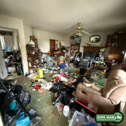 Hoarder Junk Removal in Kennesaw GA by Junk Man junk removal and Hauling featuring living room clean out services, furniture removal, clutter cleanup, trash hauling, and full residential hoarder property cleanouts