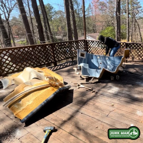 Hot tub demolition and cleanup in Kennesaw Georgia with junk Man removing Broken Spa and restoring outdoor patio space