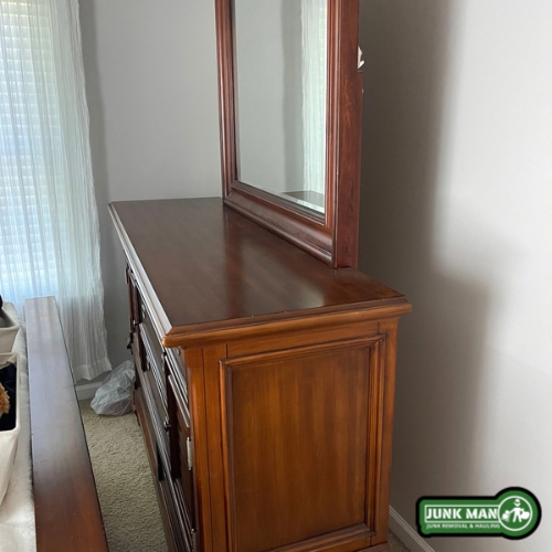 Large furniture donation pickup in Kennesaw GA removing bedroom dresser for charitable donation